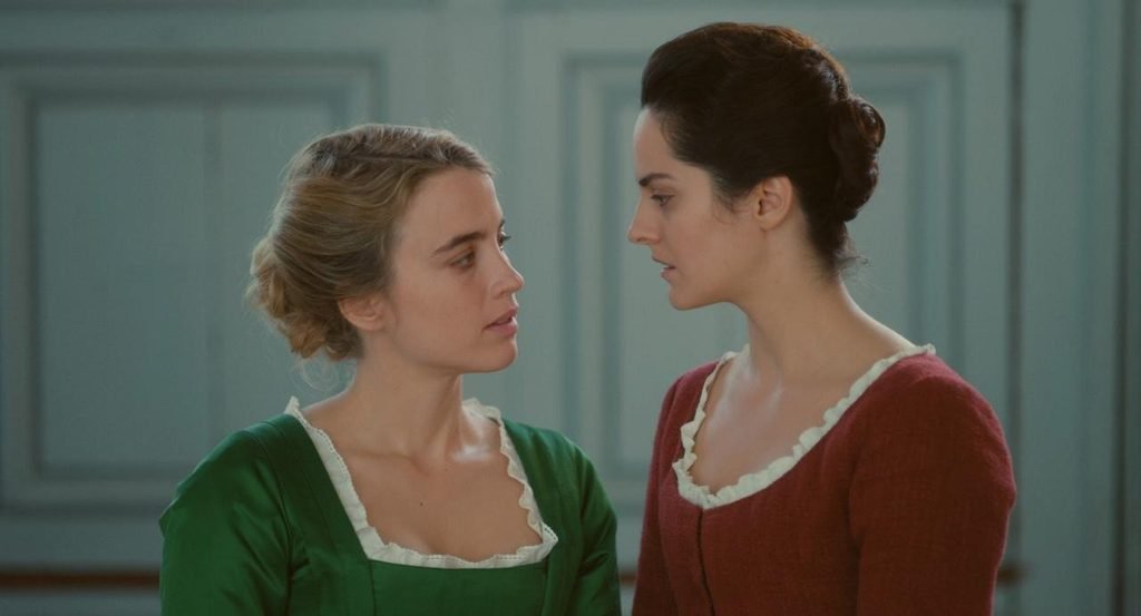 Marianne and Héloïse looking at each other in Portrait of a Lady on Fire
